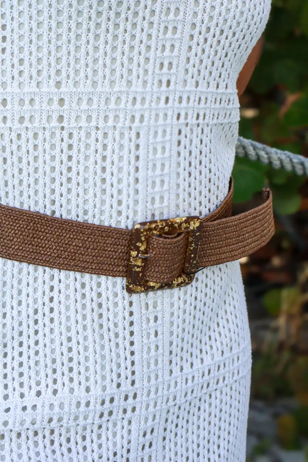 gold fleck resing buckle on model