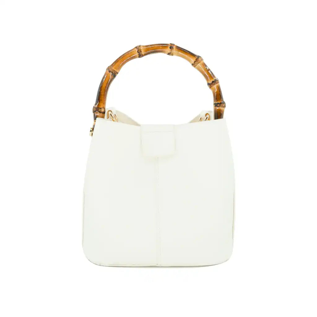 white handbag with bamboo handle