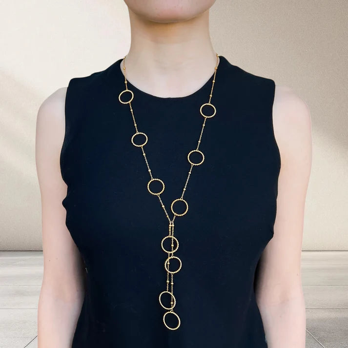 circle lariat necklace on model