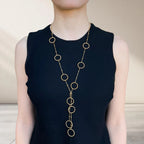 circle lariat necklace on model